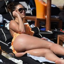 Olympia Valance sexy bikini candids on the beach in Mykonos bends over bare butt booty MixQ photos