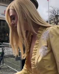 Elle Fanning nip slip at the Miu Miu Fashion Show in Paris