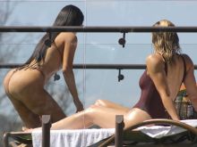 Kim Kardashian, Khloe Kardashian sexy bikini cameltoe candids in Costa Rica big boobs big ass 12x HQ photos