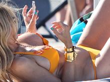Rita Rusic relaxing at the beach in hot bikini 38x UHQ