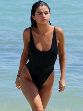 Selena Gomez wearing sexy swimsuit at a beach in Miami 10x UHQ Adds