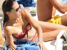 Adriana Lima sexy bikini candids on the beach in Mykonos 30x HQ photos