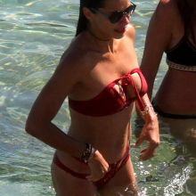 Adriana Lima sexy bikini candids on the beach in Mykonos 30x HQ photos