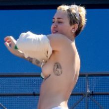 Miley Cyrus topless on a hotel balcony in Sydney 21x HQ