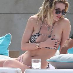 Bella Thorne nip slip boobs pop out from bikini by the pool in Cannes 45x HQ photos